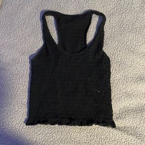 Black ribbed tank, ruffles at bottom